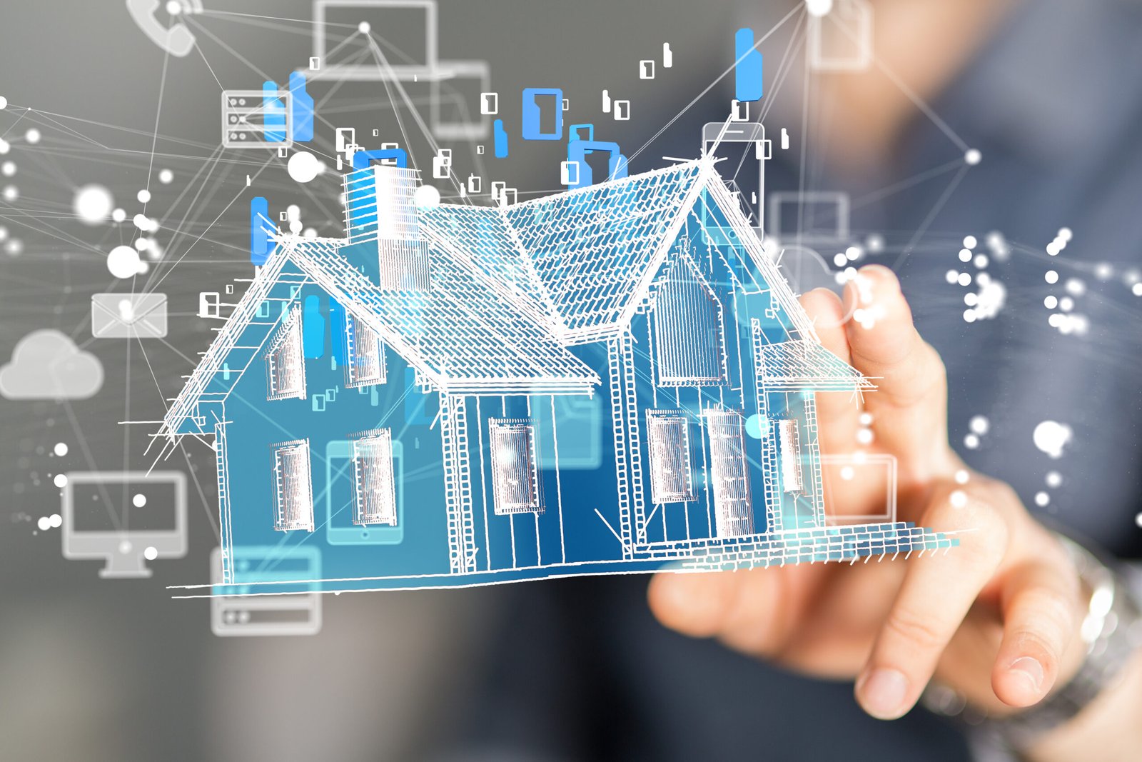 Digital house floating above a persons hand.